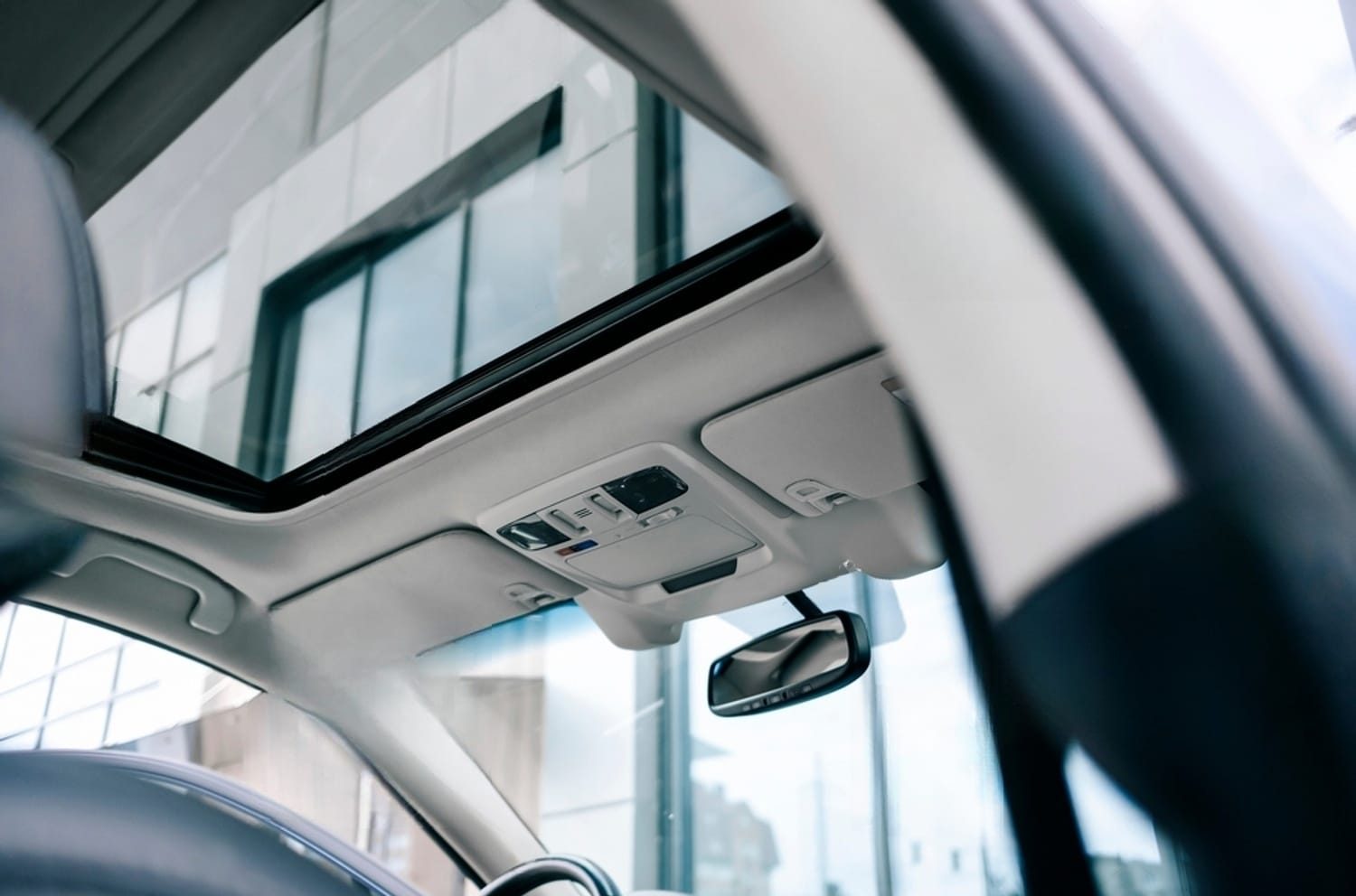 stock-photo-a-panoramic-roof-in-the-car-2215052667-transformed